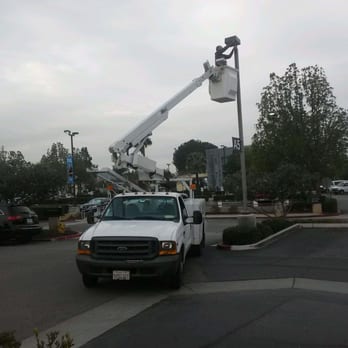 Bowen Electrical Service - Bucket truck with boom lift to provide site lighting maintenance - Lighting Fixtures & Equipment Near Me