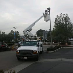Bowen Electrical Service - Bucket truck with boom lift to provide site lighting maintenance