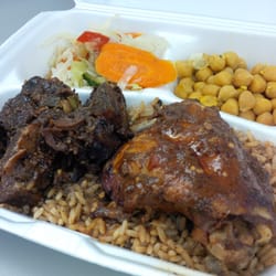 Stella's - Oxtail, jerk chicken, rice, chick peas and mixed veggies.