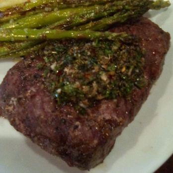 Sunset Grill - Flat Iron Steak with chimichurri, mashed potatoes and asparagus at the Sunset Grill. Delicious meal. - Bars Near Me - Las Cruces, New Mexico