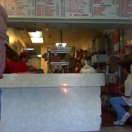 a man sitting at the counter a man sitting at the counter