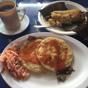 La Libertad - Pupusas with spicy cabbage and sauce. Tamal de puerco - Salvadoran Near Me - Pelham, Alabama La Libertad - Pupusas with spicy cabbage and sauce. Tamal de puerco - Salvadoran Near Me - Pelham, Alabama