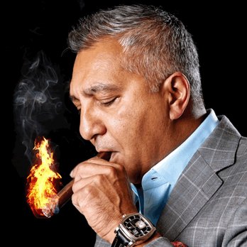 Rocky Patel Cigar Lounge - a man smoking a cigar - Tobacco Shops Near Me - Norridge, Illinois Rocky Patel Cigar Lounge - a man smoking a cigar - Tobacco Shops Near Me - Norridge, Illinois