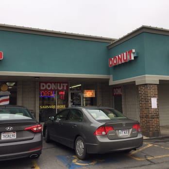 Kim's Donuts - two cars parked in front of a donut shop - Donuts Near Me - Tulsa, Oklahoma Kim's Donuts - two cars parked in front of a donut shop - Donuts Near Me - Tulsa, Oklahoma