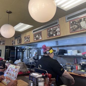 Waffle House - It was interesting to look at all the pictures - Diners Near Me - Sarasota, Florida