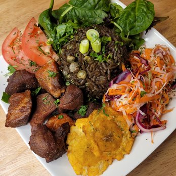 Caribbean Soul - Haitian fried pork/griot, pikliz, fried plantains and black rice/ diri djon djon - Caterers Near Me - Providence, Rhode Island