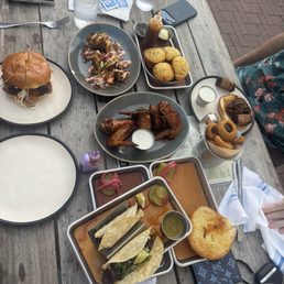 Jumbo Smoked Chicken Wings, tacos, Cornbread Muffins, Cheesy Hushpuppies, Hand-Carved Brisket Sandwich, tacos Jumbo Smoked Chicken Wings, tacos, Cornbread Muffins, Cheesy Hushpuppies, Hand-Carved Brisket Sandwich, tacos