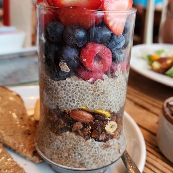 Taste Local - a glass of chia pudding with fruit and nuts - Breakfast & Brunch Near Me - Loveland, Colorado Taste Local - a glass of chia pudding with fruit and nuts - Breakfast & Brunch Near Me - Loveland, Colorado