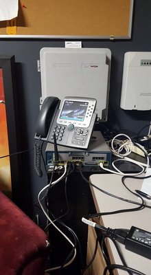 Photo of 3Packet.com - Anaheim, CA, US. Phone System + Phone readying for install at site. Verizon FIOS in background.