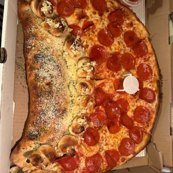 Joe's Rotisseria - Triple threat, which includes a calzone, garlic knots, and pizza. Added pepperoni. - Pizza Near Me - Roselle Park, New Jersey Joe's Rotisseria - Triple threat, which includes a calzone, garlic knots, and pizza. Added pepperoni. - Pizza Near Me - Roselle Park, New Jersey