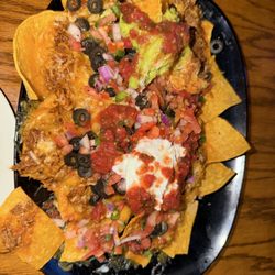 Chicken Coop Bar & Grill - This is a great little restaurant bar. Awesome food and excellent in tap beer menu!
