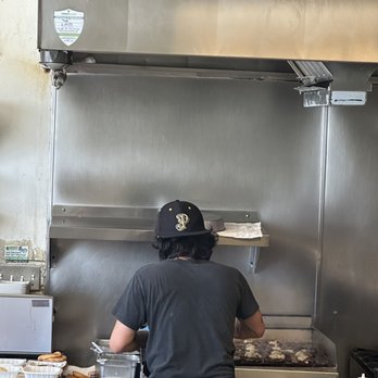 The Friendly - Guy making the burgers - Pizza Near Me - San Diego, California