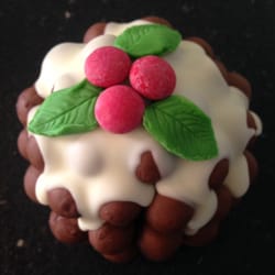Our Suc Shop - Mmmm, 
Hand crafted Xmas Pudding
superb Christmas gift or table decoration.
Edible from the inside out as its ALL chocolate.