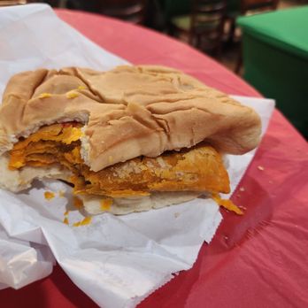 Mama's Caribbean Grill - Beef Jamaican patty with coconut bread - Caribbean Near Me - Charlotte, North Carolina