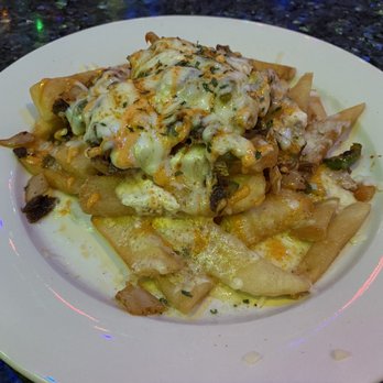 Lulu Cafe - Kimchi Fries. Trust me when I tell you, these are phenomenal! - Karaoke Near Me - Centreville, Virginia