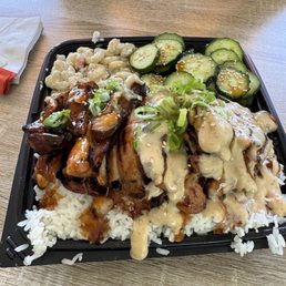 Sticky situation and garlic AF chicken with Mac salad and cucumber salad. Garlic sauce on the rice is so good. Sticky situation and garlic AF chicken with Mac salad and cucumber salad. Garlic sauce on the rice is so good.