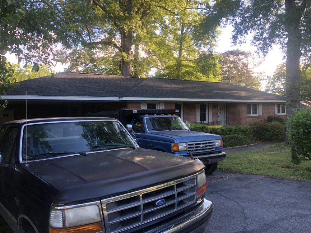 Slide of Butler Roofing