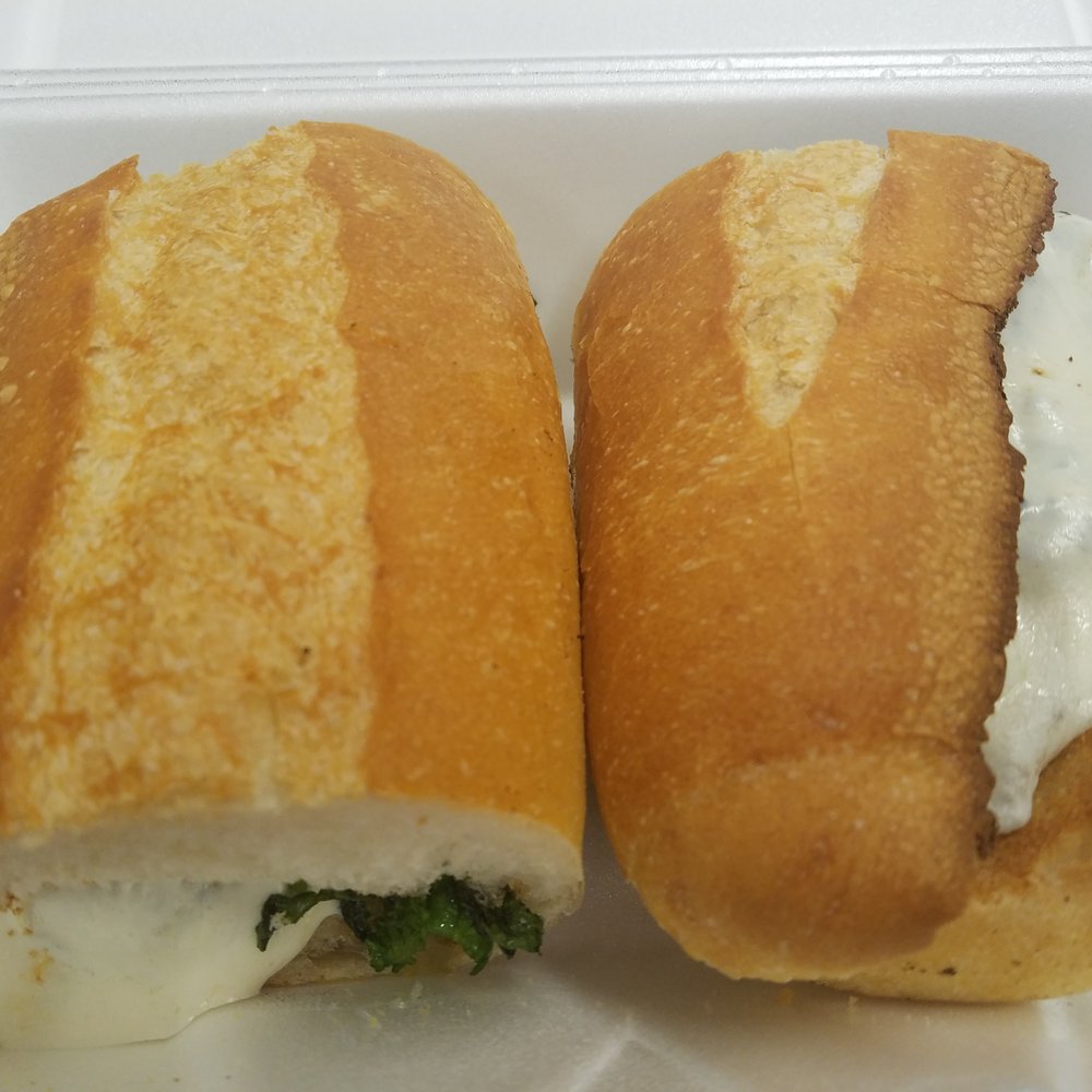 Queen Pizza - Halsey Street - breaded chicken, broccoli rabe, and mozzarella cheese on garlic bread - Pizza Near Me - Newark, New Jersey