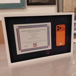 Art Frame Studio - Need a certificate framed? Why not add something else in the frame to make it more interesting - like a phone