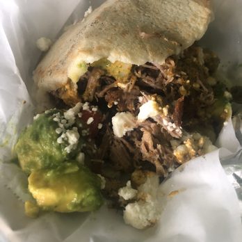 Ally's Cocina - Slow roasted pork arepa and added avocado. - Venezuelan Near Me - Kilauea, Hawaii
