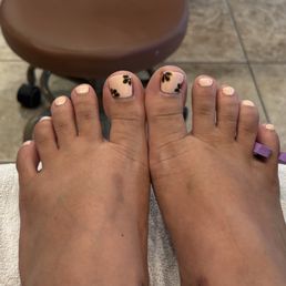 Reg polish Luxe pedicure with $10 added on for flowers and diamonds Reg polish Luxe pedicure with $10 added on for flowers and diamonds