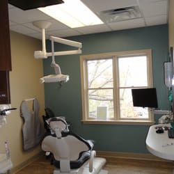 Nathanson Dental - Dental Suite with massage pad on the chair and Netflix on the ceiling!