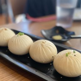 Pan Fried Pork Buns (4) 特色鲜肉煎包