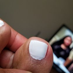 Sam's Nails And Spa - Top coat shrinkage visible.