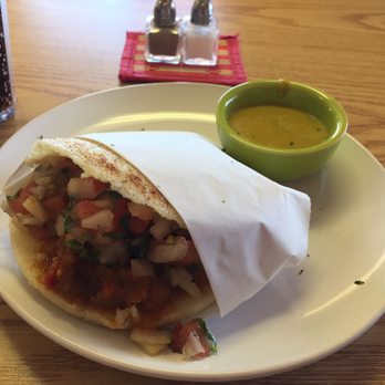 La Taguara - Eggplant Arepa with salsa. Delicious but I couldn't find the eggplant. - Venezuelan Near Me - Madison, Wisconsin La Taguara - Eggplant Arepa with salsa. Delicious but I couldn't find the eggplant. - Venezuelan Near Me - Madison, Wisconsin