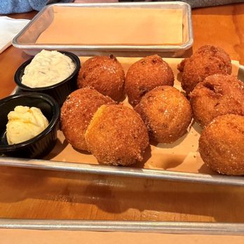 Jack's BBQ - SoDo - Buttermilk Hush Puppies with Tartar Sauce and Honey Butter - Barbeque Near Me - Seattle, Washington Jack's BBQ - SoDo - Buttermilk Hush Puppies with Tartar Sauce and Honey Butter - Barbeque Near Me - Seattle, Washington