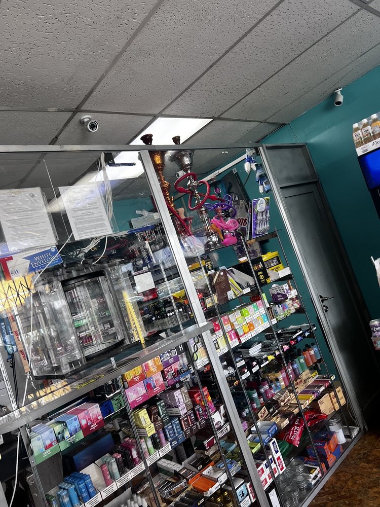 TOBACCO ZONE & MINI MART Updated September 2024 2107 W Manchester