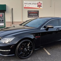 Accurate Tint and Graphics - Tinted all sides and back with Stratos 15%, Windshield with Air 80%, GlassParency windshield protectant, and corner markers with Luxe!