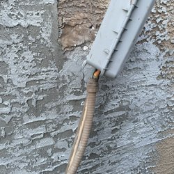 1 Stop Stucco Repair - My water timer that he left hanging off.