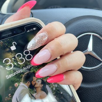 Pandora Nail Spa - Hot pink squoval nails with glitter accent and pink tips - Nail Salons Near Me - Lafayette, California Pandora Nail Spa - Hot pink squoval nails with glitter accent and pink tips - Nail Salons Near Me - Lafayette, California