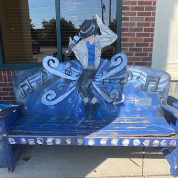 Egg Headz Café - Very cool tribute to the late Michael Jackson. The bench is in front of the restaurant - American Near Me - Tinley Park, Illinois