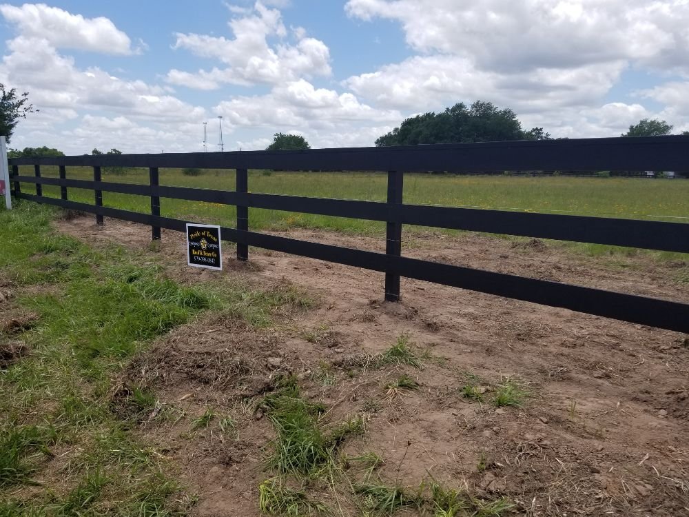 Slide of Pride of Texas Roof and Fence