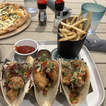 24 Coastal Grill - The fish tacos were excellent and reasonably priced. Shoestring fries were very good.....no complaints. - Bars Near Me - Jekyll Island, Georgia