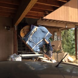 Moving a Yamaha baby grand through some very narrow cement stairs with a tight turn.