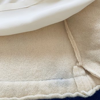 Champion Cleaners - After hem stain barely there (the color of the sweater did not change this is a different room with different lighting.) - Dry Cleaning Near Me - New York, New York
