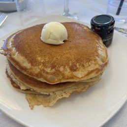 Stack of pancakes and syrup