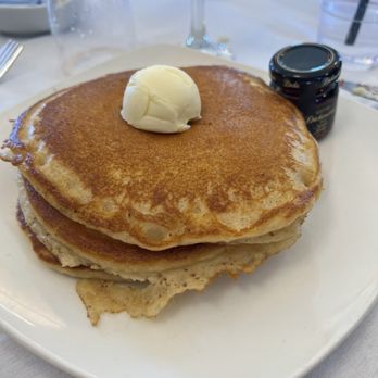Messina's Runway Cafe - Stack of pancakes and syrup - Breakfast & Brunch Near Me - New Orleans, Louisiana