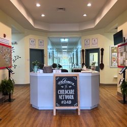 Childcare Network - Our bright, welcoming lobby features a friendly front desk where families are greeted with warm smiles...