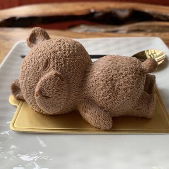 The Spoon - Nutella bear mousse. Inside has flecks of hazelnut pieces - Desserts Near Me - Stanton, California