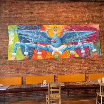 Chase's Daily - Nice brick in dining area with creative local art! - Breakfast & Brunch Near Me - Belfast, Maine