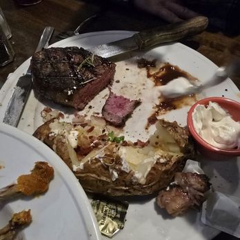 Triple Creek Kitchen & Spirits - New York strip half way eaten. So good! Cooked perfectly medium. - American Near Me - Prescott, Arizona Triple Creek Kitchen & Spirits - New York strip half way eaten. So good! Cooked perfectly medium. - American Near Me - Prescott, Arizona