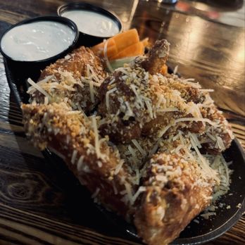 Uncommon Grill - Garlic Parm Wings  Crispy. Flavorful. Terrific blue cheese.   So close... - New American Near Me - Watertown, Connecticut
