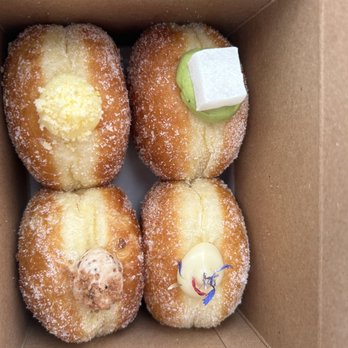 The Flour Box - Four donuts: matcha, sweet corn, fig leaf, caramel cookie(?) - Bakeries Near Me - Seattle, Washington The Flour Box - Four donuts: matcha, sweet corn, fig leaf, caramel cookie(?) - Bakeries Near Me - Seattle, Washington