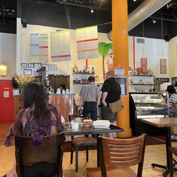 Cafecito - people sitting at tables in a restaurant - Cuban Near Me - Chicago, Illinois Cafecito - people sitting at tables in a restaurant - Cuban Near Me - Chicago, Illinois