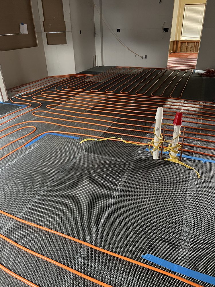 Slide of Family Drain Cleaning