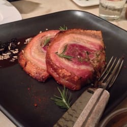 Porchetta stuffed with smoked bacon, fennel, herbs and sultana sauce.